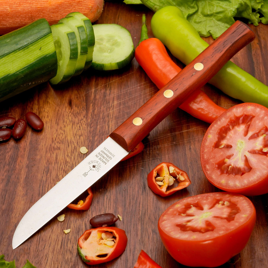 Gemüsemesser Zöppken Style mit Holzgriff, ideal für präzises Schneiden von Gemüse und Obst.