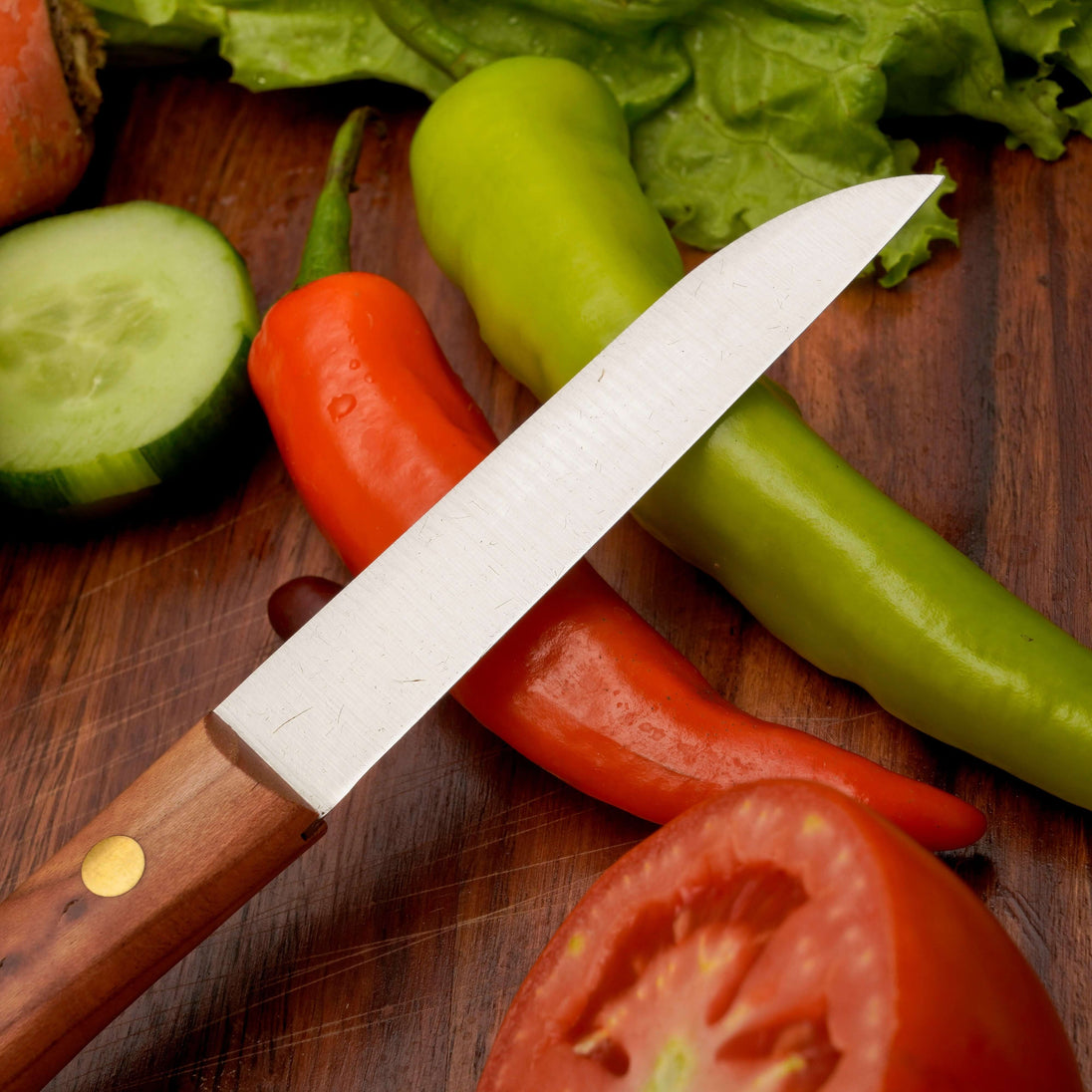 Gemüsemesser Zöppken Style mit Holzgriff, ideal für präzises Schneiden von Gemüse und Obst.