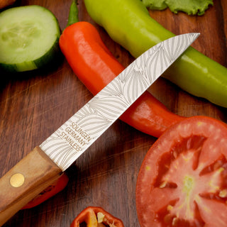 Gemüsemesser Zöppken aus Solingen mit Holzgriff, geeignet für präzise Schnitte von Gemüse und Obst.